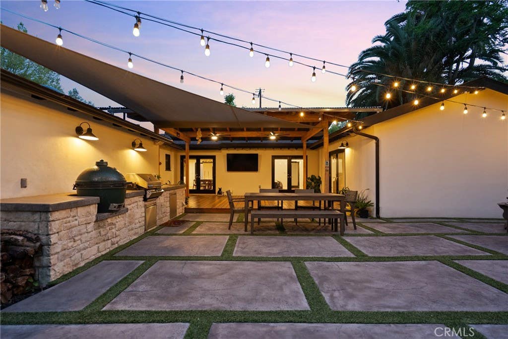 Photo of 6013 Lubao Avenue, Woodland Hills, CA 91367 (MLS # GD26181761)