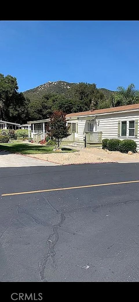 Photo of 8975 Lawrence Welk Dr #52, Escondido, CA 92026 (MLS # OC25265134)