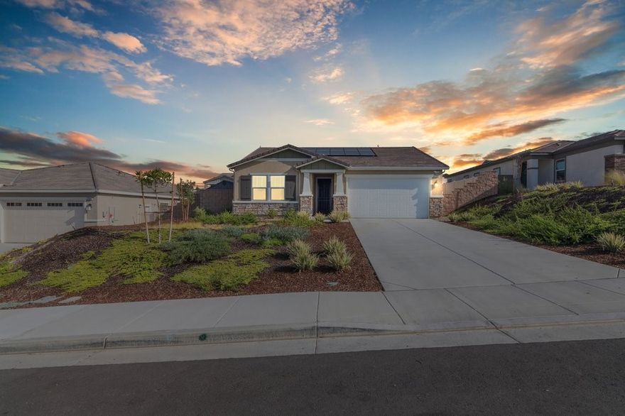 Gorgeous newer KB build single story 3 bedroom 2 bath home on a large 10,497 sf lot. Tall ceilings with ceiling fans in all bedrooms. Luxury vinyl plank flooring throughout the home. Kitchen boasts quarts counters, stainless appliances, soft close cabinets, upgraded quiet dishwasher,window over single basin sink, spacious walk in pantry. Yard has plenty of space for a pool and potential RV parking on side. Rain gutters, fire sprinklers, tankless water heater, Christmas light outlet package. 10 paid off solar panels. Minutes from freeway access.