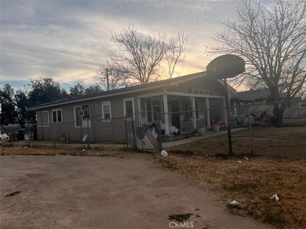 Excellent opportunity to utilize this property for its maximum reward for your client. These 3 homes with individual utilities, yes including separate water meters, can continue to rent out OR a savvy investor might decide to develop this over half acre parcel to its full potential. Can build up to 16 units, buyer to conduct its own investigation with the building dept! Each of the homes have been reroofed within the last 3 years!