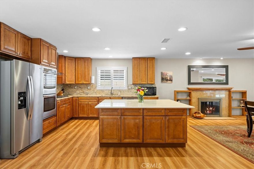 Welcome to this beautiful 3 bedroom, 2 bath, 2,031 sq ft home. Step inside and admire a bright, open floor plan that seamlessly connects the kitchen, dining, and living areas creating a welcoming space for entertaining and everyday living. Every detail was thoughtfully upgraded when this home was completely remodeled from top to bottom. Including a new roof,  a fully redesigned kitchen with upscale appliances, remodeled bathrooms with step-in-showers and built-in seating, wide 32” doors and a 48” hallway (ADA compliant), and new wood laminate flooring throughout.  The updates don’t stop there, plumbing and electrical systems, central heating and A/C, enhanced insulation, recessed lighting, the addition of a tankless water heater, energy-efficient dual-pane windows, and installed solar system ensures energy efficiency and sustainability. The backyard is enclosed with sturdy block wall fencing, ensuring privacy and security while you’re hosting gatherings on the expansive covered patio. Enjoy RV parking with full permanent hook ups giving you additional space for out of town guests.  The property is in pristine condition, with no deferred maintenance or physical deterioration, making it truly move-in ready. The surrounding area adds to the appeal, with Little Saigon and Mile Square Regional Park, which provides golf courses, walking trails, playgrounds, and open spaces for fun only minutes away. The Irvine Spectrum, 405, 5, and 55 freeways are all also nearby. Don’t miss  your chance to own a home in one of Fountain Valley's most desirable neighborhoods.