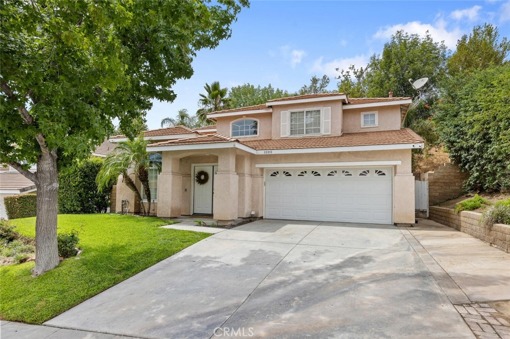 Saugus Canyon two story POOL/SPA home featuring over 1,850 square feet of living space with four bedrooms and three full baths, with a first level bedroom and bath! When you arrive you will be greeted with a professionally landscaped front yard and a grand double door entrance that leads you to the living room and formal dining with dramatic high ceilings, driftwood vinyl plank floors, and lots of windows providing plenty of natural light. The open kitchen with center island and connecting family room with fireplace is the perfect blend of functionality and comfort. Recently updated berber style carpet on the stairs, hall and bedrooms. There is a patio slider to the backyard with palm trees, two covered patios and in-ground pool and spa! The primary bedroom suite has high ceilings, a spacious walk in wardrobe closet. The primary bath has a soaking tub, separate shower and dual sinks! A direct access attached two car garage, tile roof, and central heat/air are welcome amenities on this 1994 built home. Close proximity to ALL grade levels, Highlands Elementary, Arroyo Seco Jr High, and Saugus High schools! Don’t miss this opportunity to live in this premiere Saugus locale. Low HOA dues include community pool and spa approx $58.per month.