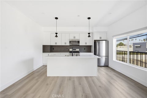 Photo of 21721 Hart St, Canoga Park, CA 91303 (MLS # SR26073122)
