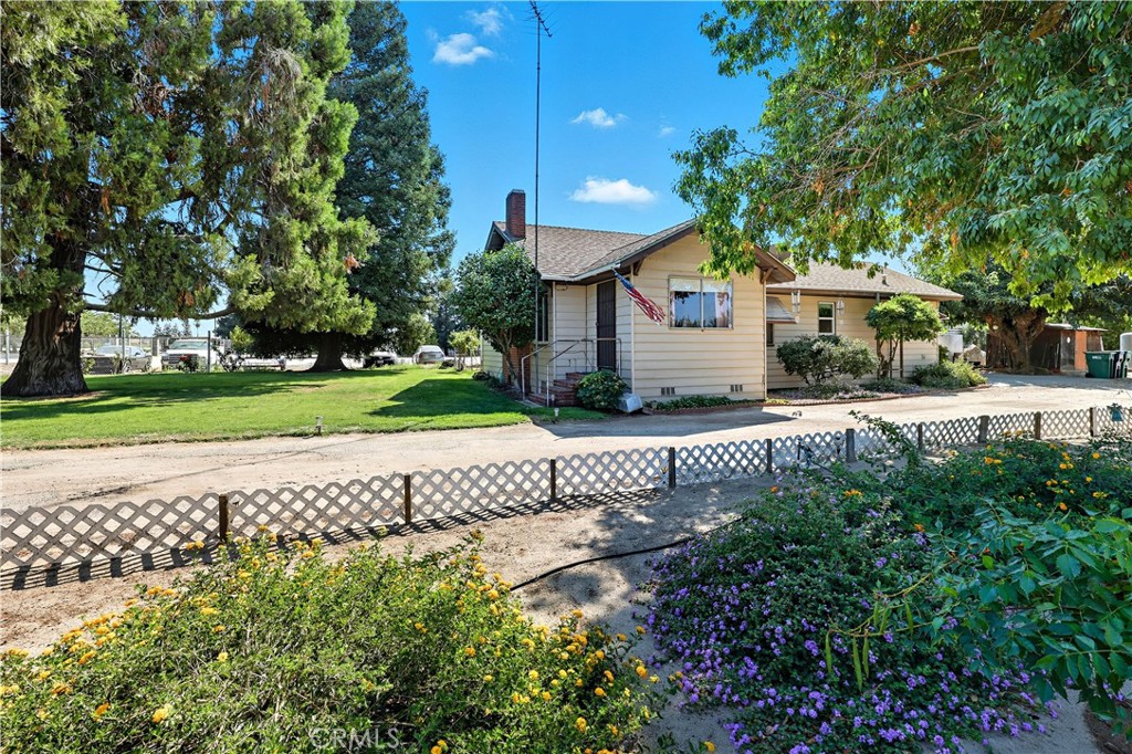 Trust sale. This doll house has 3 bedrooms , 1 bathroom, sits on 1.1+ acres, as per appraisal the home sq.ft. is 1445, the records show a different figure, age is old than what records indicate. Wall heater, fireplace, window unit, ceiling fans. This charmer was appraised May 27, 2025 at list value. Home is in very neat & clean condition, Property and home ground and shop, have been loved by this very long term family for YEARS. Oversized detached 2 car garage, with roll up door, separate unfinished 63 sq. ft. basement, 2 storage units on property , the shop is 1152 sq. ft. detached but delightful. numerous peach and fruit trees on grounds. Country living at its best. ramp is as is, built by owner, appears to be in good condition, no warranties given. This is an AS IS sale.