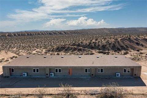 Photo of 811 Tahoe Lane, Yucca Valley, CA 92284 (MLS # JT25280755)