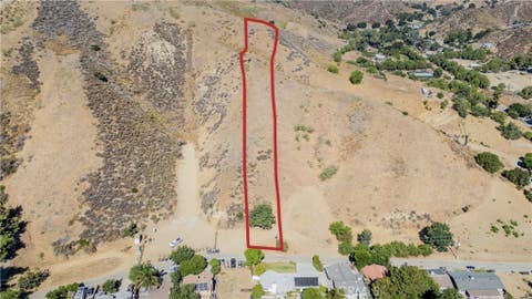 Photo of 0 Paradise Road, Val Verde, CA 91384 (MLS # SR26171737)