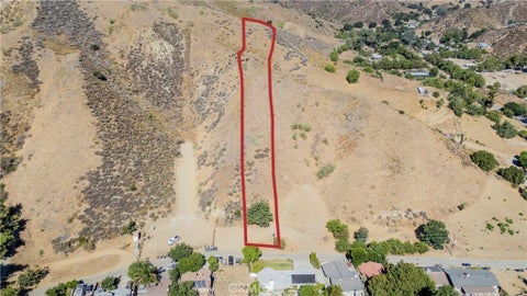 Photo of 0 Paradise Road, Val Verde, CA 91384 (MLS # SR26171737)
