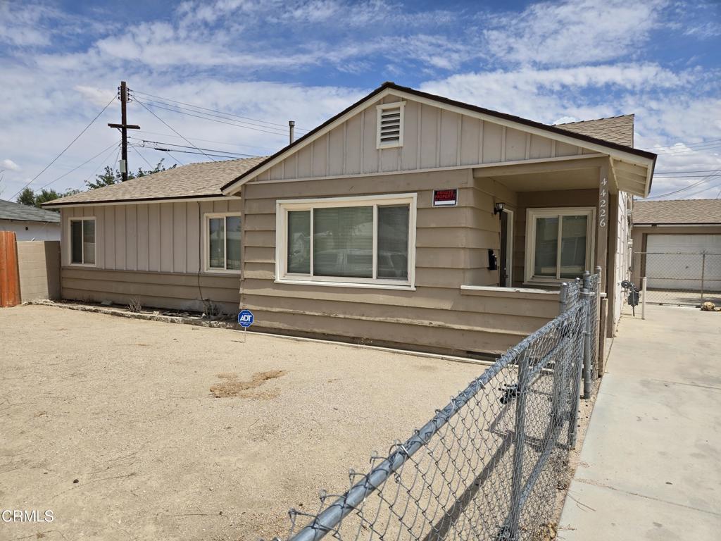 An affordable big and beautiful large 4 bedroom home with 1,705 sq. feet. New carpet, new paint, detached garage, fenced front yard. We are move-in ready just for you. Near schools, parks and shopping. Don't delay. Act today