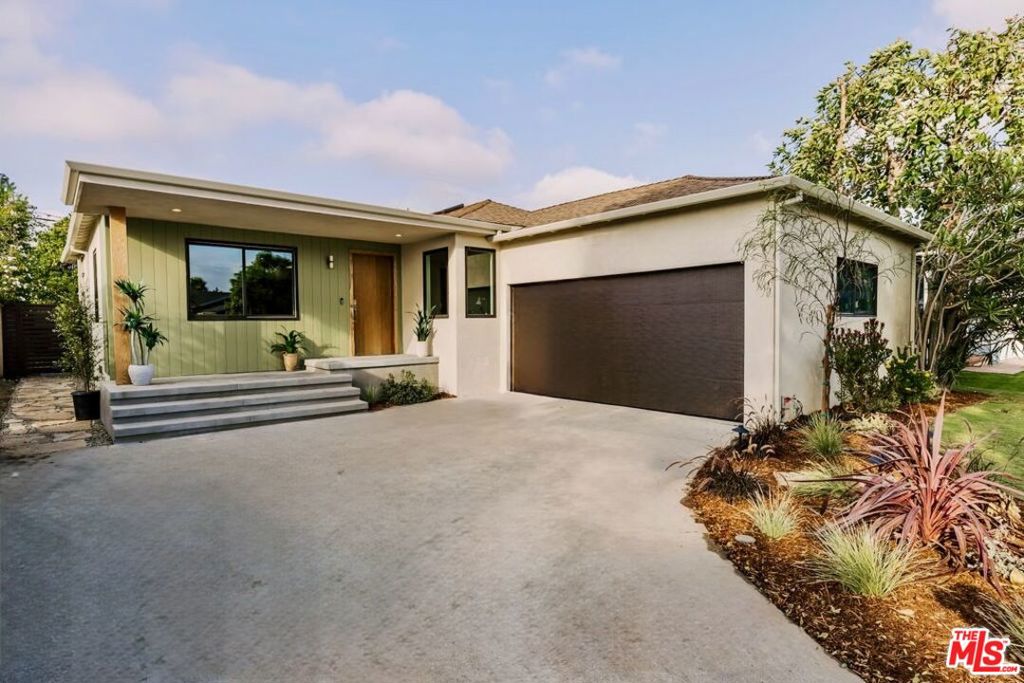 This turnkey 4-bedroom, 2.5-bathroom residence has been meticulously reimagined from the ground up with all-new systems including roof, HVAC, electrical, plumbing, windows, and more offering peace of mind with a polished, modern aesthetic. Spanning 1,741 sq ft on a 5,431 sq ft lot, the home features a sunlit, open layout that connects seamlessly to a private backyard oasis with mature citrus trees, native California drought tolerant landscaping, and a spacious patio creating a natural extension of the interior perfect for alfresco dining and relaxed entertaining. Inside, curated details include wide-plank engineered wood flooring, recessed LED lighting, vaulted ceilings in the primary suite, and custom built-ins framing a wood-burning fireplace that sets a warm, contemporary tone. Skylights usher in natural light, while the kitchen stuns with bookmatched Ceppo Cream marble countertops, custom cabinetry, a large center island, and a full suite of premium Thermador appliances. Designer finishes continue throughout: Zia zellige tiles and Breccia Cepo di Gre marble adorn the bathrooms, complemented by bespoke vanities and built-out closets. Ample parking is offered in the driveway and the finished 2-car garage is ideal for an art studio, home gym, workshop, or conventional garage use. Situated in Culver City's desirable Sunkist Park neighborhood, this property enjoys exceptional proximity to Playa Vista, Marina del Rey, tech campuses, major thoroughfares, Whole Foods, and the scenic Ballona Creek Bike Path. Zoned for the distinguished Culver City School District and just moments away from the acclaimed El Marino Language School, this home epitomizes premier Westside living and offers discerning buyers an opportunity to establish roots in a vibrant community poised for enduring growth and long-term value.