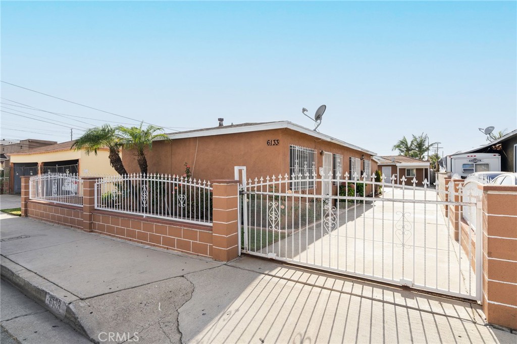 Discover a compelling multi-family residence in the heart of Huntington Park — 6133 Orchard Avenue is an off-market treasure offering approximately 1,910 sq ft of versatile living space across 4 beds and 4 baths. Built in 1954 on a rare 5,824 sq ft lot, this property presents a prime investment opportunity or value-driven acquisition in one of LA County’s most dynamic neighborhoods.
This charming multi-unit home balances character and functionality—boasting ample indoor space and solid bones, ready for contemporary upgrades or cash-flowing rental use. Perfectly located, the home is minutes from Pacific Boulevard, the region’s top commercial corridor, offering rich shopping, dining, festive events like the Carnaval Primavera, and a strong cultural pulse. Plus, it sits within LA Unified’s network of schools and is surrounded by diverse transit options—making it appealing to both residents and renters as each unit has separate gas meters.
