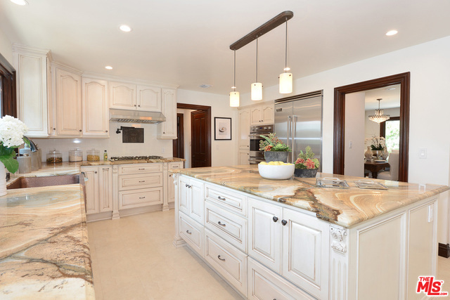 Thoroughly renovated in June 2016. Surrounded by lush greenery on a mostly-flat lot. Located on a peaceful cul-de-sac,this two-story property has a gated entrance for utmost privacy. The property opens up to a magical backyard oasis with large pool and serene waterfall and over size deck for ultimate entertaining. Grand two story foyer opens to formal living and dinning rooms with a grand fire place. A brand new chef's kitchen and custom cabinetry, professional grade appliances and breakfast room that opens to patio/deck. The house offers five spacious bedrooms and office/game room as well as six bathrooms.