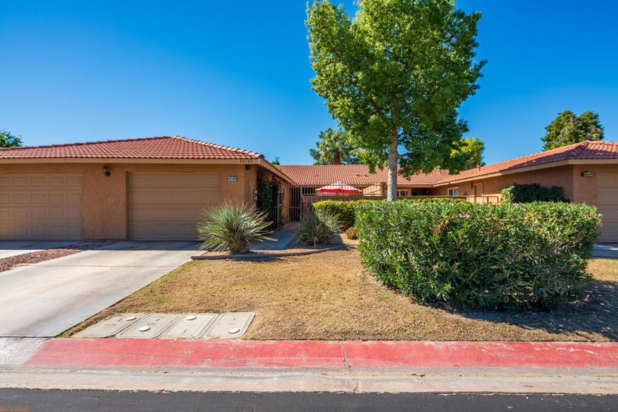 This beautifully updated Mountain and Pond View Condo, located in Indian Palms Country Club, offers a range of appealing features for the discerning buyer. The inviting home showcases white oak flooring, granite countertops in the kitchen, modern cabinetry, and an impressive covered rear patio. Situated on a cul-de-sac, it provides excellent bedroom separation, a lovely enclosed entry patio, a spacious driveway, and a single-car garage. This property is perfect as a full-time residence or an exquisite winter retreat for those looking to escape the harsh winter chill.  Has been seasonally rented by return guests for 5+ years that are still interested in future returns!