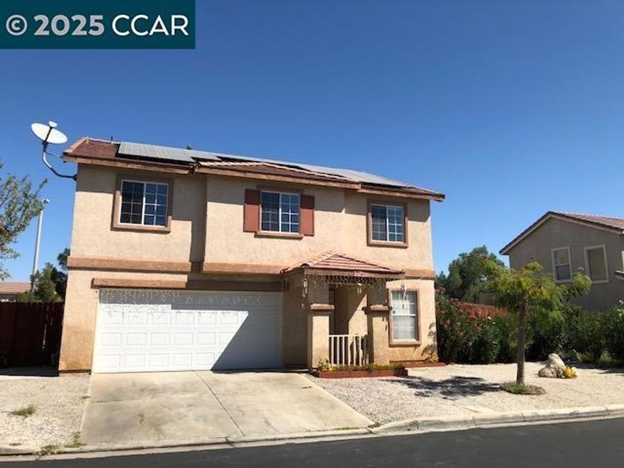 Gorgeous inside and out! This home boasts of 5 BR and 2.5 BA. There is a fireplace in the Living Room. French doors open to a well maintained covered back patio. The Master suite is ample sized with a Bathroom equipped with a separate enclosed shower and tub. A walk in closet completes the suite. The laundry room is located on the second floor for easy access. The home is equipped with solar panels. You will be amazed at how low your utilities will be, even if you have the AC on 24/7!