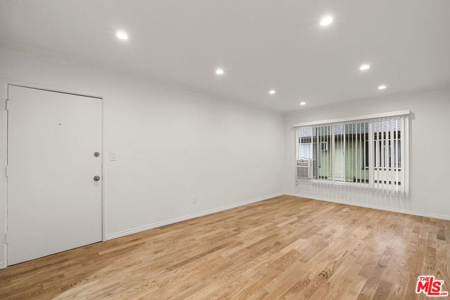 Beautifully appointed 1 bed, 1 bath apartment - courtyard/pool facing, top floor, in prime West Hollywood location! Gourmet kitchen, custom cabinetry, stainless steel appliances, (gas stove, dishwasher, refrigerator, microwave), Heating and A/C, stone countertops, hardwood floors throughout, stone tile bathroom with walk-in shower, dimmable LED lighting, pool, laundry facilities onsite and one dedicated parking space. Perfect for those interested in residing in one of the trendiest neighborhoods in West Hollywood. In close proximity to transportation, famous dining, fashion, design, entertainment, cafes, parks, etc.