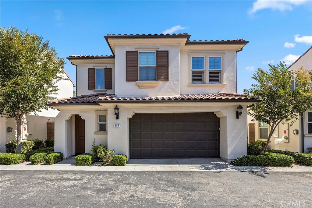 Experience serene living in the highly desirable Sage II community of Portola Springs, Irvine! This beautifully upgraded detached home is filled with natural light and features a spacious open layout. Enjoy the stylish family room with elegant hickory laminate flooring, custom shutters, and Roman shades. The modern kitchen boasts stunning quartz countertops, a welcoming island, pendant lighting, and a premium Kitchenaid gas range. Step into the luxurious backyard, complete with exquisite landscaping and a gas line for outdoor cooking, perfect for relaxing by the charming fountain. Upstairs, find three bedrooms, two full bathrooms, and a versatile office loft, including a generous master suite with a marble bathroom, dual vanities, a soaking tub, walk-in shower, and a spacious walk-in closet. Additional highlights include keyless garage entry, built-in overhead storage, and an upgraded 19-panel solar system for energy efficiency. With designer finishes like 9-foot ceilings, recessed lighting, and custom paint, this home is ideally situated near shopping centers and parks, with access to over 15 amenity-rich parks in Portola Springs and top-rated Irvine Unified schools.