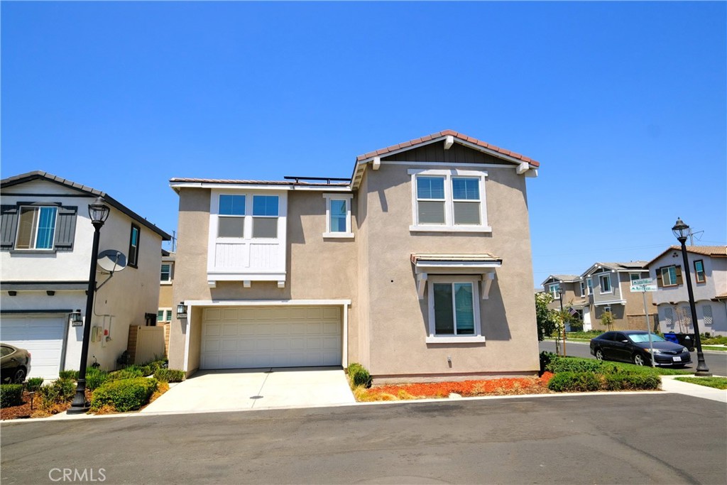 Priced to sell! Welcome to this nearly new two-story home in the heart of Ontario! Built in 2022, this property residence offers 4 bedrooms, 3 bathrooms, and a loft, with 2,365 square feet of living space. At the entrance, a bedroom with a full bath is situated on the left—ideal for parents and guests. The foyer flows naturally into an open-concept layout filled with abundant natural light. The contemporary design seamlessly connects the living, dining, and kitchen areas, creating an inviting space for both everyday living and entertaining. The modern kitchen is a chef’s delight, featuring stainless steel appliances, granite countertops, ample cabinetry, and a pantry. A large island with a breakfast nook provides the perfect spot for casual dining. Upstairs, additional bedrooms and a versatile loft further enhance the home’s comfort and functionality. Conveniently located near shopping and dining, with easy access to Freeways 60 and 15, this property presents an excellent opportunity for both living and investment. Adding to its appeal, the brand-new Ontario New Haven Elementary School—currently under construction—is scheduled to open in 2026, truly within walking distance.