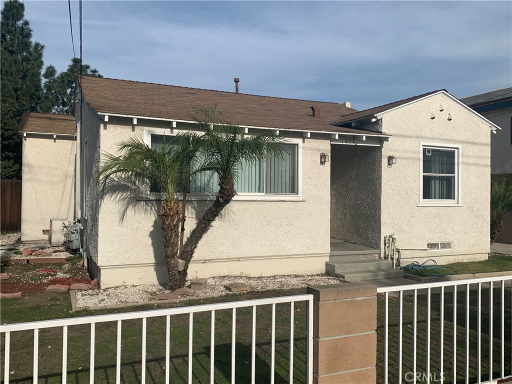 Welcome to this beautifully maintained 3-bedroom, 2-bath front unit in the desirable North Downey area — a perfect blend of comfort, style, and convenience! Enjoy a bright, airy interior with brand new SPC flooring and abundant natural light streaming through newer vinyl windows. Brand new central A/C system (to be installed before move-in) keeps you cool year-round. A cozy fireplace adds warmth and charm to the master bedroom. The kitchen and bathrooms feature elegant granite countertops, complemented by a newer stove and modern cabinetry. Enjoy added privacy with a separate entrance to the master bedroom — ideal for multigenerational living or extra personal space. Secure & Convenient: Located behind a secure iron gate, with a 1-car garage and ample additional parking. Though part of a duplex, this front unit is thoughtfully designed to feel like a standalone home, offering both privacy and independence. Set in a quiet, secure neighborhood, you’ll be just minutes from top-rated schools like Downey High, shopping centers, theaters, restaurants, and more!