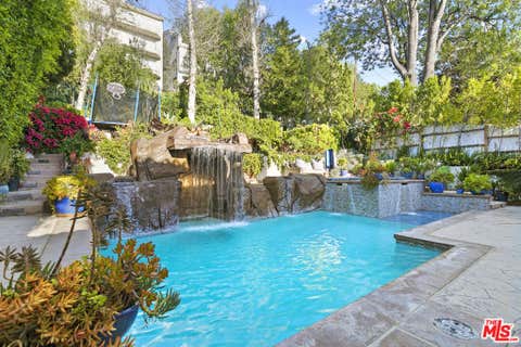 Photo of 5176 Don Pio Drive, Woodland Hills, CA 91364 (MLS # 26838609)