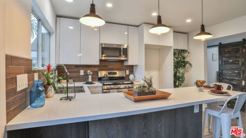 Photo of 128 N BURLINGTON Avenue, Los Angeles, CA 90026 (MLS # 26984985)