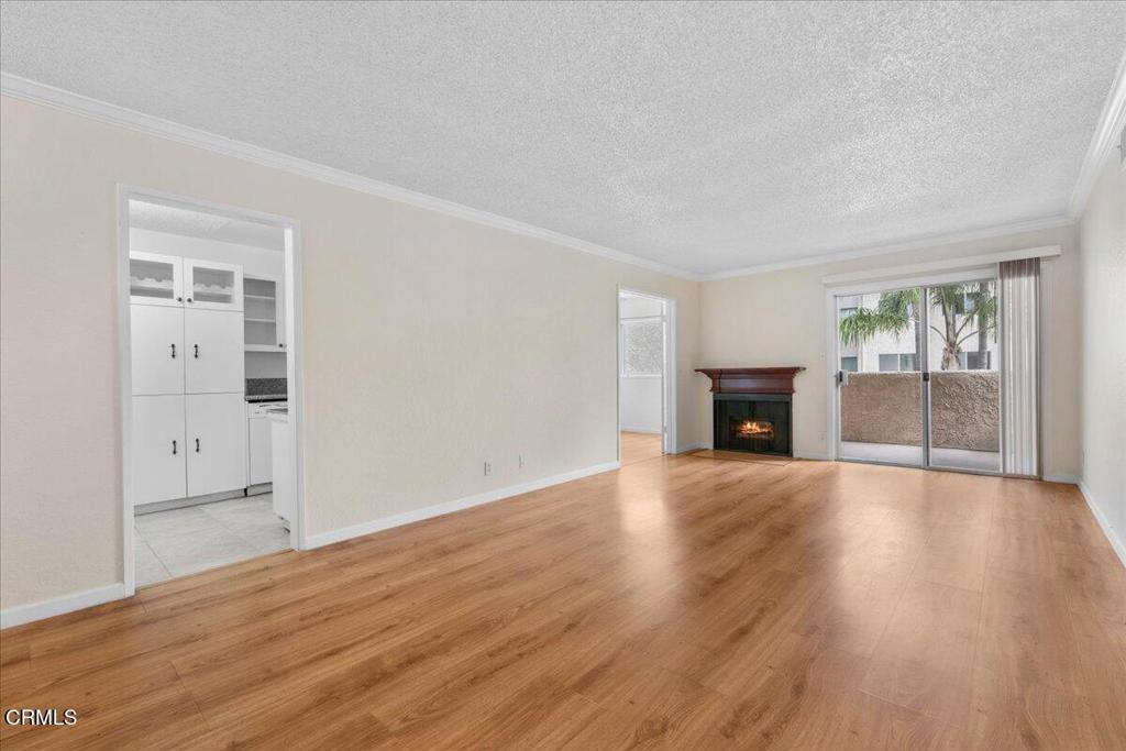 Welcome to this beautifully maintained 1-bedroom, 1-bathroom condo offering approximately 885 square feet of comfortable living space. Located in a well-kept complex, this upper-level unit features abundant natural light, an open layout, and a peaceful view overlooking the community pool.The spacious living and dining areas flow seamlessly to a private balcony, ideal for enjoying your morning coffee or evening breeze. The kitchen offers ample storage while the generously sized bedroom includes a large walk-in closet.