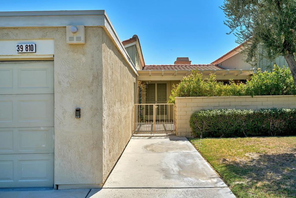 Welcome to 39810 Bedford Drive, a beautifully appointed 3-bedroom, 3-bathroom condominium located in the serene, gated community of Wilshire Palms in Rancho Mirage. Spanning 1,922 square feet, this single-level home is offered fully furnished and is available for immediate occupancy on a one-year lease. Step inside to discover a spacious great room featuring vaulted ceilings and travertine flooring, creating an inviting atmosphere for relaxation and entertaining. The kitchen is equipped with granite countertops, cherry wood cabinetry, a breakfast bar, and a dining area, perfect for culinary enthusiasts. Both the great room and the primary suite open to a private patio overlooking lush greenbelts, providing a tranquil outdoor retreat. Residents of Wilshire Palms enjoy access to six swimming pools and spas, lighted tennis and pickleball courts, and beautifully maintained grounds. The community is conveniently located near premier shopping, dining, and entertainment venues, including The River, El Paseo, and the McCallum Theatre. Eisenhower Medical Center is just minutes away, and Palm Springs International Airport is a short 20-minute drive. Don't miss this opportunity to lease a fully furnished home in one of Rancho Mirage's most desirable communities. Contact us today to schedule a private showing.
