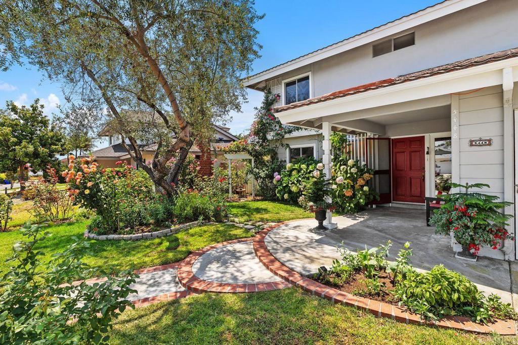 Tucked away on a peaceful cul-de-sac in one of North Clairemont’s most sought-after neighborhoods, this rare 5-bedroom, 2.5-bath gem offers 2,437 sq ft of inviting living space—designed for comfort, connection, and easy indoor-outdoor living. As you enter the front door, you’ll feel a sense of calm and familiarity. The main level features a flexible floor plan with a convenient downstairs bedroom and half bath—ideal for guests, an office, or multi-generational living. The thoughtfully placed kitchen opens seamlessly to the dining area and spacious living room with a cozy fireplace, while a charming pass-through connects to the expansive family room, where vaulted ceilings and oversized windows frame vibrant views of the backyard. Freshly painted and newly carpeted in 2025, the home feels light, fresh, and move-in ready—offering the perfect canvas for your personal touch. Upstairs, the primary suite is complemented by three additional bedrooms and a large hall bath, offering space for everyone. Outside you’ll discover a backyard made for California living—complete with a generous patio and custom wood pergola, perfect for outdoor dining, weekend gatherings, or simply unwinding under the sky. And if you're lucky, you might even catch a butterfly or two dancing by. Nature lovers will appreciate the proximity to Marion Bear Cobb Trail offering easy access to trails and a sense of escape, all while being close to beaches, shopping, the city, and everyday conveniences. This isn’t just a house—it’s a home where life happens. A place to grow, to gather, and to make lasting memories. Come experience the warmth, peace, and possibility of this North Clairemont treasure.