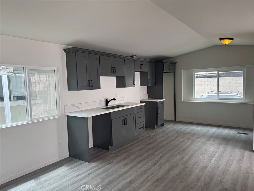 Turn in key! Cozy 2 bedroom, 1 bathroom, completely remodeled home located in the desirable community of Rainbow MHP. This charming home offers a comfortable living space for anyone looking for a affordable housing option with low maintenance costs. Convenient location with easy access to local amenities. Friendly community with a sense of neighborhood camaraderie. If you’re looking for a cozy and affordable place to call home, this is a great opportunity.