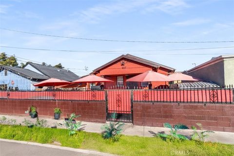 Photo of 657 W 66th St, Los Angeles, CA 90044 (MLS # RS25253327)