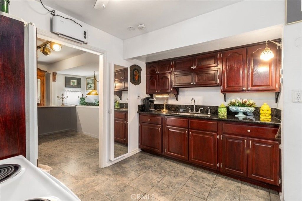 Photo of 657 W 66th St, Los Angeles, CA 90044 (MLS # RS25253327)