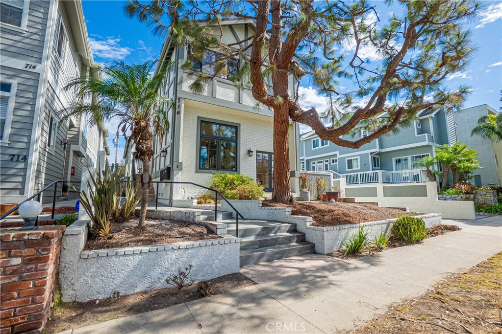 Step into your dream beachside home! This fully detached 3-bedroom, 3-bath townhome is just two blocks from the sand in South Redondo Beach. Recently remodeled, it combines modern upgrades with effortless coastal charm.
The main living area is bright and open, featuring wide-plank floors and a newly tiled fireplace. French doors lead to a private patio and yard, perfect for morning coffee, evening drinks, or entertaining friends. The gourmet kitchen is a chef’s delight with Thermador appliances, marble countertops, a farmhouse sink, and a walk-in pantry. A sunny breakfast nook with window seating adds a cozy touch.
Upstairs, the primary suite is your personal retreat with vaulted ceilings, a skylight, dual closets, and a sleek modern bathroom. Secondary bedrooms are spacious, with vaulted ceilings and a stylish shared bath. Even the laundry room impresses with grey herringbone flooring and plenty of storage.
The attached 2-car garage comes with epoxy flooring and an EV charger. Located west of PCH, you’re just steps from the beach, the Esplanade, and Riviera Village. Live the ultimate South Redondo lifestyle—sun, sand, and sophisticated coastal living await!