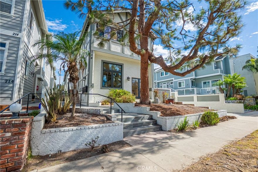 Step into your dream beachside home! This fully detached 3-bedroom, 3-bath townhome is just two blocks from the sand in South Redondo Beach. Recently remodeled, it combines modern upgrades with effortless coastal charm.



The main living area is bright and open, featuring wide-plank floors and a newly tiled fireplace. French doors lead to a private patio and yard, perfect for morning coffee, evening drinks, or entertaining friends. The gourmet kitchen is a chef’s delight with Thermador appliances, marble countertops, a farmhouse sink, and a walk-in pantry. A sunny breakfast nook with window seating adds a cozy touch.



Upstairs, the primary suite is your personal retreat with vaulted ceilings, a skylight, dual closets, and a sleek modern bathroom. Secondary bedrooms are spacious, with vaulted ceilings and a stylish shared bath. Even the laundry room impresses with grey herringbone flooring and plenty of storage.



The attached 2-car garage comes with epoxy flooring and an EV charger. Located west of PCH, you’re just steps from the beach, the Esplanade, and Riviera Village. Live the ultimate South Redondo lifestyle—sun, sand, and sophisticated coastal living await!
