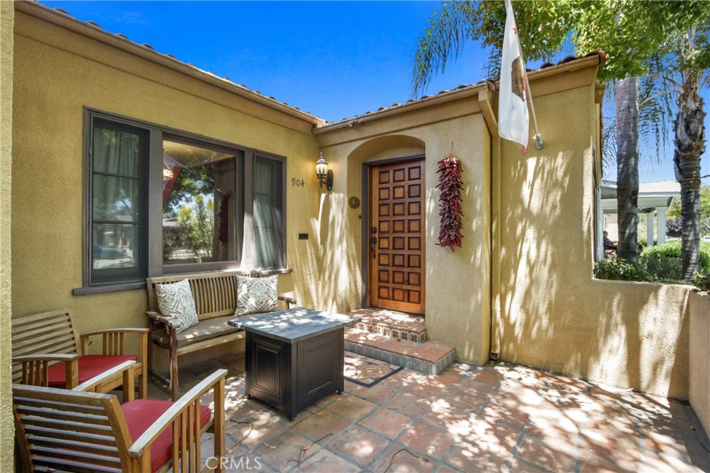 FURNISHED AND GORGEOUS and Pride of Ownership 3bd/2ba SPANISH 1927 CHARMER on a quiet tree-lined cul-de-sac street in prestigious Washington Square/Santa Ana. Meticulous condition with terrific curb appeal, mature foliage/trees, and a long driveway. Beautiful living room with fireplace and large picturesque window with an arched entrance into the formal dining room, light/bright kitchen with breakfast nook and custom built-ins and arched window, upgraded stainless steel Bosch French door refrigerator, vintage refurbished 1950s O'Keefe and Merritt stove. Inside Laundry Room Master en-suite with a spacious bathroom/accented vintage custom tilework. All three bedrooms offer ample living/closet space. Second bathroom accented with vintage custom tilework. Beautiful/original hardwood floors throughout. Central air. PRIVATE BACKYARD offering a built-in Lynx BBQ/kitchen area, covered patio, orange and monkey tree, and professional low maintenance landscaping. Small and friendly pets are welcome. Owner can deliver the home furnished or remove personal items. No need to preview!