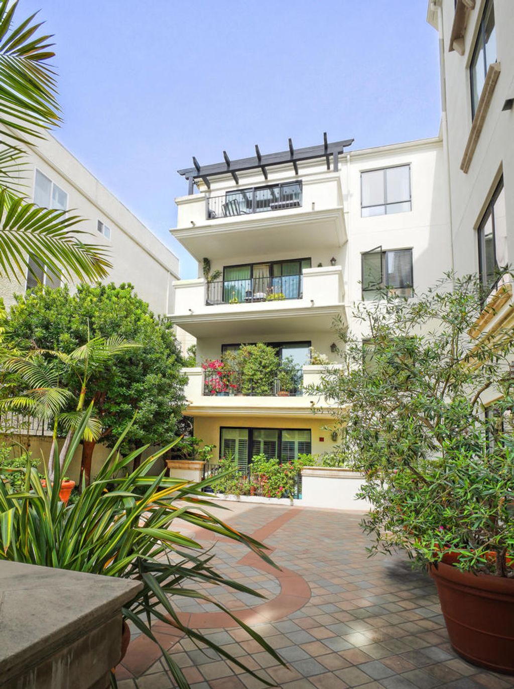 Photo of 1530 Camden Avenue #Ph-1, Los Angeles, CA 90025 (MLS # 219145706DA)