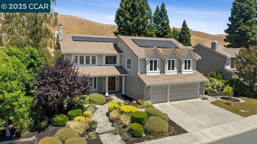 OPEN 8/2 & 8/3, 1PM-5PM! Experience luxury living! Located in the Diablo Highlands community, this serene and private home has everything you’ve been looking for. The thoughtfully designed floor plan features high ceilings, hardwood floors, large windows, and lots of natural light. The kitchen is a chef’s dream, and is equipped with stainless steel appliances, large center island, pantry, lots of storage, and flows seamlessly into the expansive family room, making it great for everyday living and entertaining. Ideal for guests or multigenerational living, the main level includes a full bedroom with an en-suite bath. Upstairs, discover a junior primary suite and a luxurious primary retreat featuring a sitting area with fireplace, a private balcony overlooking the backyard, and a spa-inspired bath with a dual-entry walk-in shower and a walk-in closet with custom built-ins. An extra large bonus room offers versatility—perfect as a playroom, home theater, or game room. Step outside and enjoy peaceful evenings or lively gatherings in the beautifully landscaped backyard, complete with a spacious patio, pool, and spa. Additional highlights include no rear neighbors, EV charger, smart home upgrades, and a storage shed. Enjoy the convenience of being just minutes from downtown Danville.