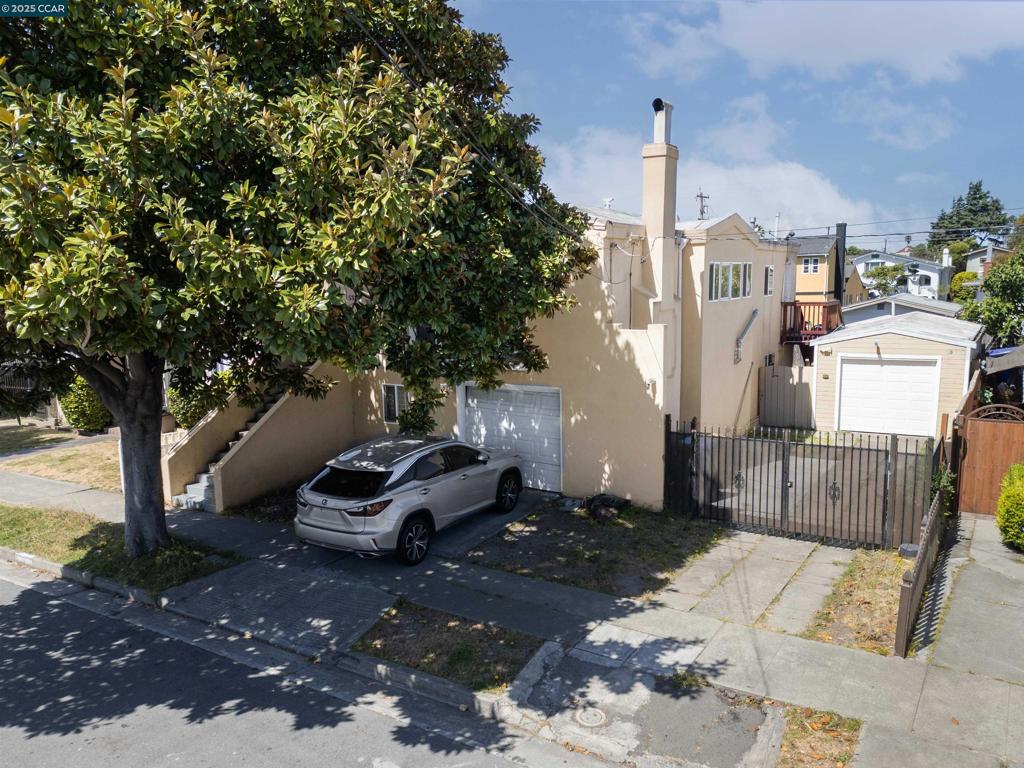 A Truly Must See Duplex to Appreciate with Over 2,300 Living Square Feet (Total: 5 Beds & 2 Baths) and Great Potential for Much More = Attached Garage, Detached Garage, Side Yard RV Parking Access, and Back Yard !!! Bottom Ground Level Unit with Newer: Kitchen Cabinets & Granite Kitchen Countertops, Gas Stove, Tile Flooring & Laminate Wood Flooring, Custom Tile Bathroom, Large Living Room, Double-Pane Windows, Central Heating, and Interior Access to Attached Garage. Both Units Have Separate: Water, Gas, and Electric Meters !!!