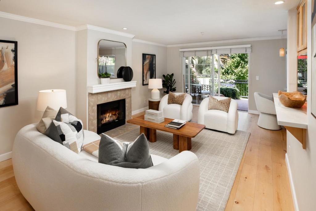 Sophisticated and serene, this updated one-bedroom, one-bath condo is nestled in a beautifully maintained community in the heart of Menlo Park. Stylish wood floors and a refreshed kitchen offer modern comfort, while a newer furnace plus A/C adds year-round comfort. The spacious, elevated deck overlooks lush landscaped gardens and a sparkling pool, providing both privacy and exceptional natural light to the home. The oversized bedroom, with room enough for a desk and sitting area, features large windows that flood the room with natural light. Enjoy access to resort-style amenities including a pool, hot tub, fitness center, library, and additional storage. Two dedicated parking spaces are included. Located in the award-winning Menlo Park school district and just one block from Burgess Park with its playgrounds, sports fields, library, and community center. Only 1.5 miles to downtown Menlo Parks vibrant shops, restaurants, and Caltrain.