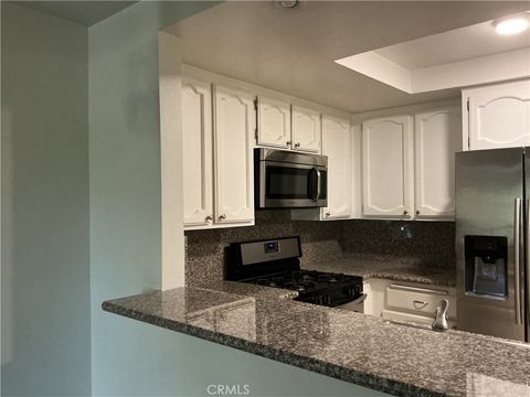 Photo of 21650 Burbank Blvd, Woodland Hills, CA 91367 (MLS # SR26094851)
