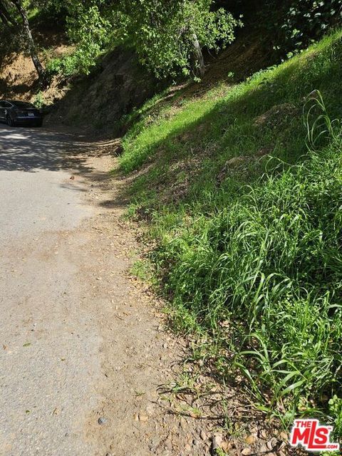 Photo of 10468 Scenario Lane, Los Angeles, CA 90077 (MLS # 26661581)