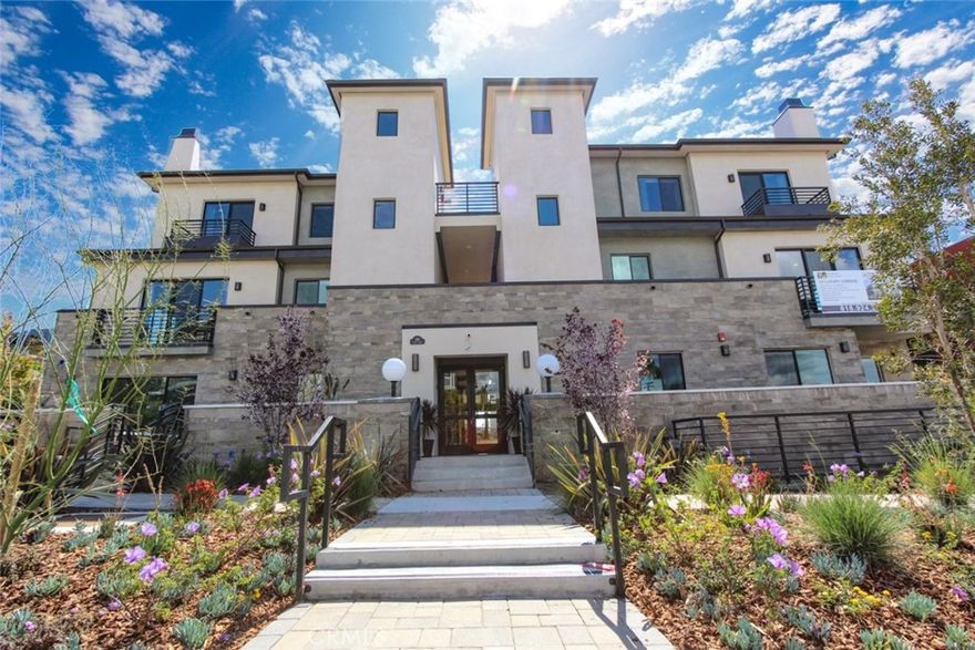 Special December Move-In Offer! Sign a 12-month lease and get the 13th month FREE—hurry, this limited-time offer is only available for December move-ins! Experience luxury living at its finest in one of Glendale’s most coveted locations. Step into this stunning Front Unit 3-bedroom, 2.5-bathroom condo boasting an exceptional open floor plan designed for both comfort and style.

Entertain or unwind in the inviting living room featuring a cozy fireplace, or enjoy your favorite beverage on the private patio with serene views. The impeccable gourmet kitchen impresses with high-end cabinetry, top-of-the-line appliances, a sleek tile backsplash, and a breakfast bar ideal for casual dining or hosting.

The expansive primary suite is your personal retreat, offering a large walk-in closet and a spa-inspired bathroom with a walk-in shower and a soaking tub. Additional highlights include beautifully crafted interior doors, stunning flooring with thick baseboards, premium built-in storage, high ceilings with recessed lighting, a dedicated laundry area, and Central A/C.

All this just minutes from Glendale’s best—The Galleria, Americana at Brand, Alex Theatre, and the iconic Porto’s Bakery & Café. Don’t miss this rare opportunity!