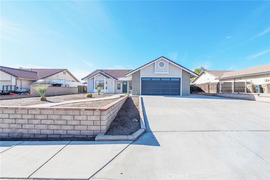 Discover the perfect blend of style and functionality in this beautifully updated 4-bedroom, 2-bath home featuring a sparkling pool in a peaceful Hesperia neighborhood. With 1,720 sq ft of thoughtfully designed living space, this move-in-ready residence offers everything you need to live, relax, and entertain in comfort.
Step inside to find an airy open-concept layout featuring high ceilings, recessed lighting, fresh neutral paint, and new wood-look laminate flooring throughout the main areas. Natural light pours through large windows and sliding glass doors, creating a warm and inviting ambiance. A cozy fireplace anchors the spacious living and dining areas, perfect for gatherings or quiet evenings in.
The fully remodeled kitchen is a chef’s dream, showcasing brand-new stainless steel appliances, stylish shaker cabinets, and gleaming quartz countertops—ideal for both meal prep and entertaining.
Each of the four generously sized bedrooms offers plush new carpeting and ample closet space. The updated hall bath features a reglazed tub/shower combo and modern finishes. Retreat to the private primary suite, complete with a freshly renovated ensuite boasting an upgraded double sink vanity, framed mirrors, and new flooring.
Step outside to your personal backyard oasis, where a sparkling in-ground pool await. Whether hosting weekend BBQs or enjoying sun-soaked afternoons, this outdoor space is designed for fun and relaxation. Additional highlights include large RV parking, a 10x18 shed, new garage door, new pool equipment, and fresh interior/exterior paint.
With its modern updates, spacious layout, and desirable location, this home checks all the boxes. Don’t miss your opportunity—schedule your private showing today before it’s gone!