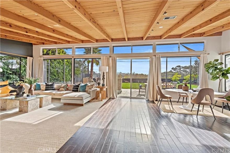 Undiscovered and Magical – A Hidden Gem in Freedom Homes



Tucked away in a closed loop very quiet and peaceful, this one-of-a-kind newly remodeled canyon front property offers incredible views that stretch from the mountains to the Pacific Ocean. Set on an oversized 8,000 sq. ft. lot and backing directly to Canyon Park, one of Orange County’s most beautiful and best-kept secrets, this home combines privacy, nature, and coastal living in a way that is rarely found.



A custom two-story design, the residence features a brand-new custom kitchen never been lived in, three spacious downstairs bedrooms, each with its own dedicated or ensuite bath. One suite enjoys a private entrance, making it ideal for visiting guests, in-laws. Upstairs, the nearly 700 sq. ft. primary retreat is a true sanctuary, offering dual walk-in closets, a spa-like bath, sitting area, and two balconies that capture stunning park, mountain, and ocean views. Sunrises and sunsets are on full display from every upstairs window. There is a full-sized side by side two car, fully finished, garage, and parking for two cars in the driveway as well. Storage space is abundant throughout the property



Beyond the home itself, the location is simply unmatched. You can walk through your private gate in the back yard directly into Canyon Park and be at Nudae Coffee of the Fermentation Farm in minutes directly from the backyard through the park. The Freedom Homes neighborhood is renowned for its parks and natural spaces, its charm, tree-lined streets, and vibrant community spirit. Surrounding Canyon Park, residents enjoy direct access to trails that lead all the way to the beach, without ever crossing a street until you reach PCH. This rare connectivity makes walking, biking, and outdoor living part of everyday life. The community also benefits from fresh ocean breezes, excellent air quality, and proximity to Victoria school, the smallest (and best) school in the Newport Mesa School District as well as award-winning private schools like Waldorf and Cardin Hall



This is more than a home, it’s a lifestyle. You are 5 minutes from the beach and you're living in a peaceful retreat where nature, health, and community converge, all within minutes of the best that Costa Mesa and Newport Beach have to offer.