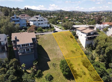 Photo of 21478 Iglesia Drive, Woodland Hills, CA 91364 (MLS # SR26162563)
