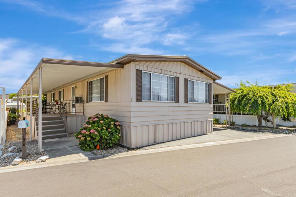 Charming 2-Bedroom Adult Living Mobile Home 55+ Spacious Master Suite & Stylish Upgrades. Welcome to your next chapter in comfort and style! This beautifully maintained 2-bedroom mobile home is located in a quiet, friendly adult living community. Step inside to discover a thoughtfully designed layout featuring a spacious master bedroom complete with a cozy sitting area-perfect for relaxing with a book or morning coffee. The kitchen is a true standout with modern finishes, ample cabinetry, and plenty of counter space, ideal for both everyday cooking and entertaining. The guest bathroom boasts a rare double-sink vanity, offering both elegance and functionality.. Enjoy the peace of mind that comes with a low-maintenance lifestyle, all while being close to community amenities and local conveniences. Whether youre downsizing or simply looking for a welcoming place to call home, this property is a must see!