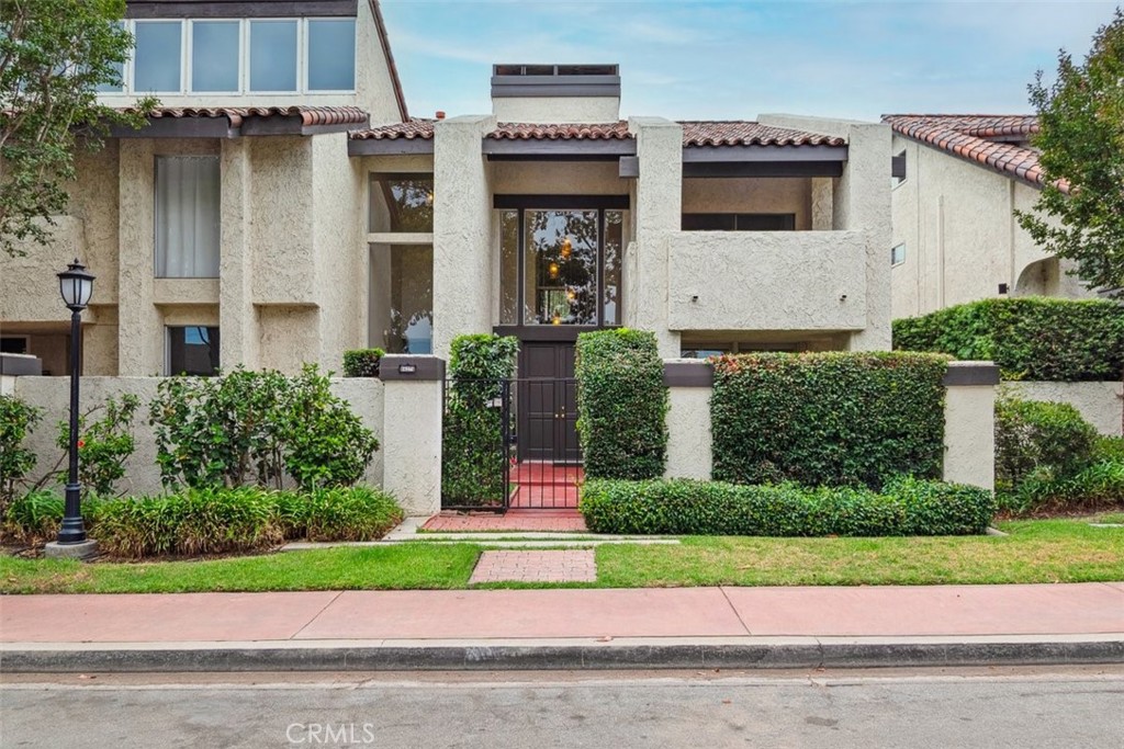 NESTLED WITHIN THE HIGHLY COVETED, PRIVATE AND GATED COMMUNITY OF CROWN POINTE, NEAR VIRGINIA COUNTRY CLUB IN LONG BEACH, WITH LOW HOA DUES; WELCOME TO THIS LOVELY SPACIOUS TWO STORY END UNIT TOWNHOME THAT OFFERS 2 BEDROOMS, 2 1/2 BATHROOMS, OPEN FLOOR PLAN, LARGE 2 STORY ENTRY FOYER, LIVING ROOM, STEP-DOWN DEN WITH FIREPLACE, WET BAR & BUILT-IN BOOKCASE, DINING ROOM, BREAKFAST AREA & A 2 CAR DETACHED GARAGE WITH LAUNDRY FACILITIES. THE LARGE UPSTAIRS PRIMARY SUITE HAS A VAULTED CEILING, BATHROOM WITH DOUBLE SINKS, A SOAKING BATHTUB, SEPARATE SHOWER, PRIVATE WATER CLOSET, LARGE WALK-IN CLOSET & A SECOND CLOSET WITH MIRRORED DOORS. THE 2ND JUNIOR BEDROOM SUITE HAS ITS OWN PRIVATE ENSUITE BATHROOM, WALK-IN CLOSET, BUILT-IN BOOKCASE AND DIRECT ACCESS TO A PRIVATE RELAXING COVERED PATIO BALCONY THAT OFFERS VIEWS OF THE FRONT YARD AND NEIGHBORHOOD. THE UPSTAIRS HALLWAY HAS VIEWS OF THE DOWNSTAIRS 2 STORY ENTRY FOYER. THE SAME FAMILY HAS OWNED THIS LOVELY HOME FOR OVER 29 YEARS. TAX RECORDS INDICATE OVER 2,000 SQ. FT. OF LIVING SPACE. THE PRIVATE ENCLOSED REAR YARD OFFERS THE PERFECT SETTING FOR MEDITATING, THINKING, READING, HAVING YOUR MORNING COFFEE, AFTERNOON REFRESHMENTS OR ALFRESCO DINING.. BENEFICIAL FEATURES INCLUDE A FRESHLY PAINTED INTERIOR, NEW ROOF UNDERLAYMENT, NEW OVEN, NEW TRASH COMPACTOR, NEW WATER HEATER, NEW TRASH COMPACTOR, NEW CARPETING, NEW FLOORING IN ALL BATHROOMS, NEWER DISHWASHER, NEWER COOKTOP, NEWER DISPOSAL, CENTRAL AIR & HEATING, A NEW REFURBISHED PRIVATE IN-GROUND HEATED SPA WITH A NEW HEATER, FILTER AND PUMP. THE PRIVATE GATED FRONT YARD OF THE HOME HAS DIRECT ACCESS TO TERRYLYNN PLACE AND THE 2 CAR DETACHED GARAGE IS LOCATED IN THE REAR YARD AND ACCESSED THROUGH THE PRIVATE GATED COMMUNITY. THIS IS A GREAT OPPORTUNITY FOR YOU TO ACQUIRE A LOVELY TWO-STORY TOWNHOME IN A PRIVATE AND GATED COMMUNITY. AN EXCELLENT INVESTMENT FOR A FAMILY SEARCHING FOR A LARGE HOME FOR RELAXING WITH FAMILY, FRIENDS, ENTERTAINING AND CREATING A LIFETIME OF MEMORIES. A REMARKABLE POSSIBILITY FOR YOU TO OWN A TRULY CHARMING HOME. YOU DO NOT WANT TO MISS OUT ON THE CHANCE TO CREATE YOUR VERY OWN PERSONAL PARADISE! CONVENIENTLY LOCATED CLOSE TO PLACES OF WORSHIP, PARKS, RESTURANTS, HOSPITAL, CHILDREN'S PLAYGROUND, TENNIS COURTS, WALKING, JOGGING & BIKING PATHS, NATURE TRAIL, WETLANDS, DOG PARK, FREEWAYS, BLUE LINE TRAIN, GOLF COURSE, SHOPPING, AWARD WINNING SCHOOLS, COLLEGES & SUMMER CONCERTS IN NEARBY LOS CERRITOS PARK.....PLEASE READ ALL MLS SUPPLEMENTS