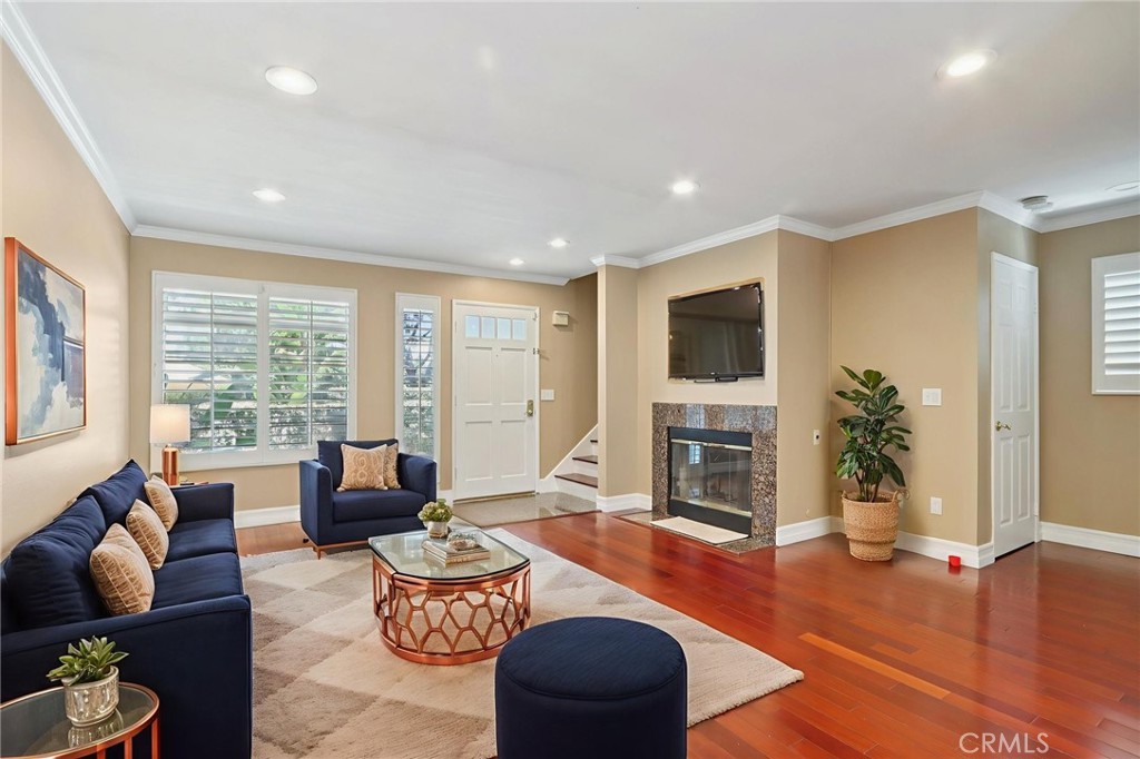Welcome to Somerset Ranch — a Fabulous Turnkey Townhome!
This beautifully upgraded and desirable end-unit offers 2 spacious bedrooms, 2.5 bathrooms, and an open-concept layout perfect for modern living and entertaining. Enjoy the convenience of an attached two-car garage, indoor laundry, and two private outdoor patios—ideal for relaxing or hosting guests.
Inside find fresh interior paint, elegant Brazilian cherry hardwood floors, custom wood shutters, recessed lighting, granite countertops, and stainless steel appliances. The upgraded fireplace adds a touch of warmth and charm to the open living space.
Located in a secure, well-maintained community with a spa and BBQ area, this FHA-approved townhome is ideally situated near freeways, Downey Landing, Downey Promenade, Porto’s Bakery, Paramount Drive-In, Hollydale Regional Park, and more.
Whether you're staying in or heading out, this home checks all the boxes—style, comfort, location, and lifestyle. You may never want to leave!