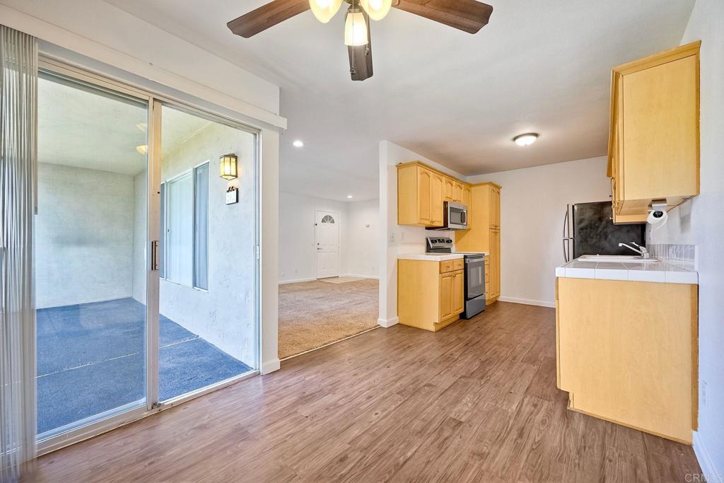 Boasting a top floor unit with 2 good sized rooms and 2 full bathrooms and along with a large patio that overlooks the grass area and pool. It has brand new interior paint, new oven, and a new microwave.There is a washer and dryer conveniently in the unit. The complex is gated and the unit comes with two assigned parking spots and a storage unit along with a community pool!