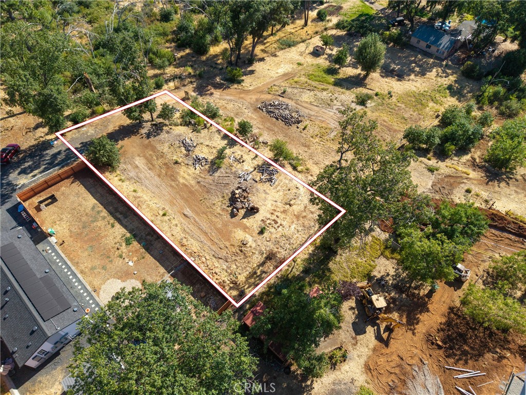 This .31 acre parcel featuring rockwalls, some trees, and some fencing is ready to be your new home! Previously there was a 2 bedroom home on the lot, and PID is connected and paid for. Come enjoy the views and build your new home!