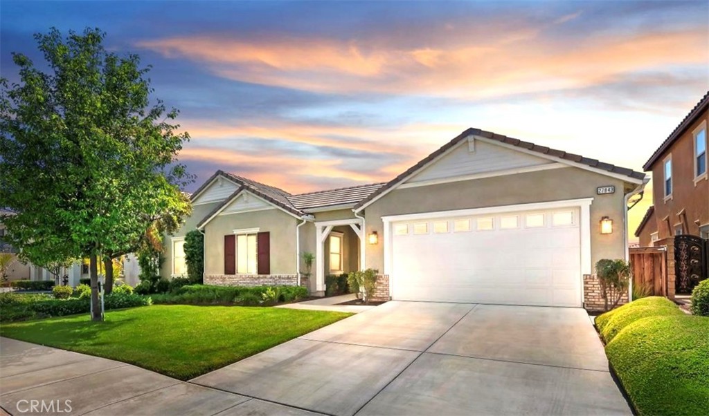 Welcome to 27843 Huron Court—a beautifully upgraded single-story home located in the prestigious Heritage Lake community of Menifee. Built in 2015, this spacious 4-bedroom, 2.5-bath home offers 2,785 square feet of refined living space with exceptional upgrades and energy-efficient features throughout.
Step inside to discover luxury vinyl plank flooring, upgraded baseboards, and an open-concept layout that blends comfort and style. The chef’s kitchen is the heart of the home, showcasing an extended countertop and cabinetry upgrade, a stunning center island with quartz countertops, a double oven, pendant lighting, and newer stainless steel appliances—perfect for both entertaining and everyday living.
Retreat to the expansive primary suite, complete with a spa-like bathroom, while three additional bedrooms provide ample space for guests, a home office, or multi-generational living. Additional highlights include PAID SOLAR, a whole-house water filtration system, and a tandem 3-car garage offering extra storage and convenience.
Enjoy the beautifully landscaped backyard, designed for relaxation and low-maintenance living. Unwind under the custom Aluma Wood patio cover, or soak in your private spa while enjoying the peaceful atmosphere. Artificial turf completes the outdoor space for a pristine look year-round.
Exceptional Community Amenities. Residents enjoy access to a 25-acre lake with a scenic 1.3-mile walking trail, paddle boating, and catch-and-release fishing. Community highlights include two sparkling pools—one a waterfront Jr. Olympic-sized pool—and a splash pad. Sports enthusiasts will love the expansive sports park with baseball, basketball, tennis, pickleball, and soccer facilities. The neighborhood is dotted with parks, playgrounds, walking and biking trails, and features a vibrant community center. With regular security patrols, Heritage Lake offers peace of mind and a true sense of community.
Prime Location & Lifestyle
Conveniently located near the 215 Freeway, this home offers easy access to shopping centers, dining, and schools. Enjoy the serene setting with mountain views—just 20 minutes from Temecula Wine Country and close to Menifee’s rapidly growing developments.
Don’t miss this rare opportunity to own a turn-key, energy-efficient home in one of Menifee’s most desirable communities. Schedule your private tour today and experience the incredible lifestyle at Heritage Lake!