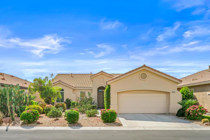 SOUTH facing OPEN great room plan. This 2 bedroom PLUS DEN home features an open floor plan with large island kitchen, over-sized guest bedroom, spacious sized 3rd room/DEN and water saving desert landscaping of the front and rear yards. The primary bedroom is also good sized, has dual vanities, separate tub & shower and large walk-in closet. This home also features a SOLAR SYSTEM with very reasonable monthly lease payments of $120 that keep your electric bills LOW!! Heritage Palms is a premier adult community that features an 18 hole championship golf course, tennis courts, pickle ball courts, fitness center, indoor & outdoor pools, grill room, billiards room, card rooms, social clubs and more.