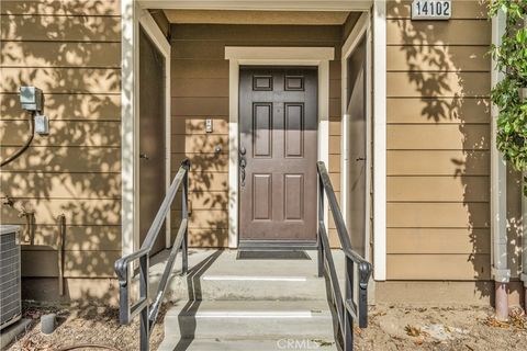 Photo of 14102 W Chapparel Lane, Van Nuys, CA 91405 (MLS # SR26040002)